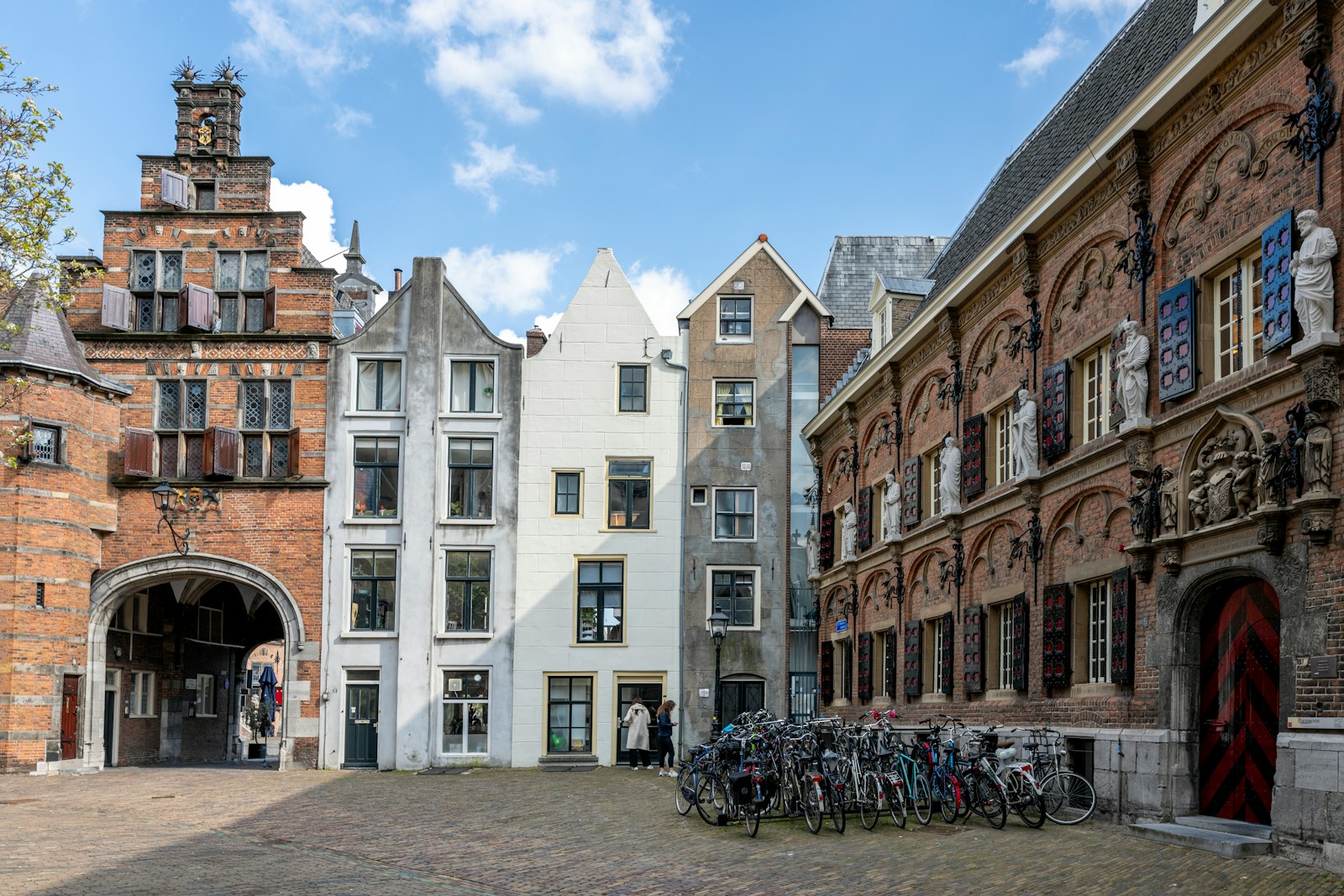 people walking on street near buildings during daytime